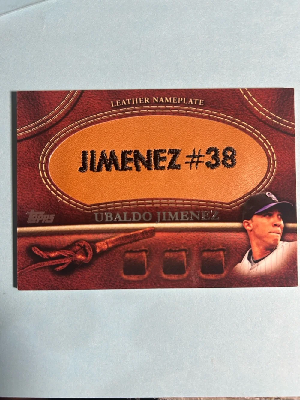 2011,Topps Ubaldo Jimenez ,Colorado Rockies Leather Nameplate Card #MGL-UJ